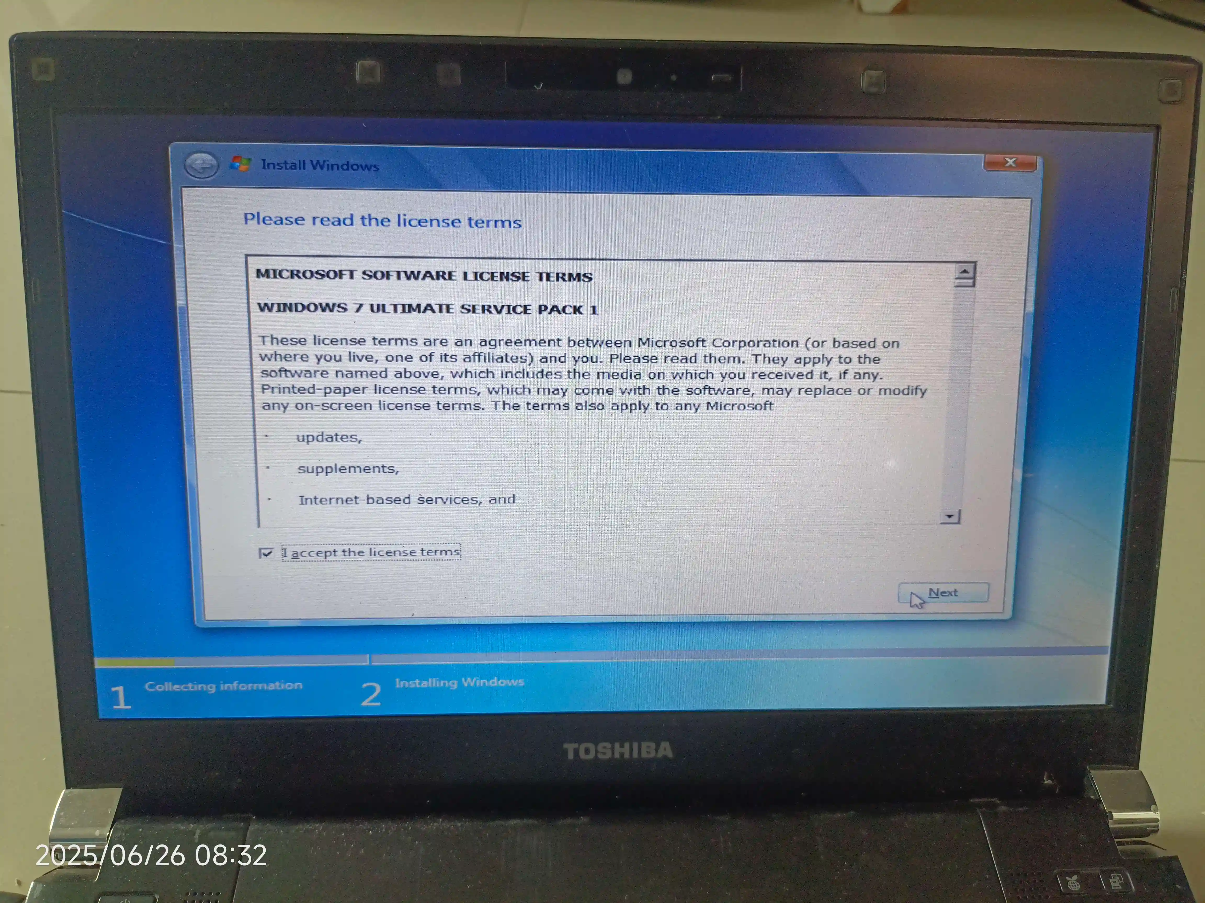 the screen shows a licence agreement